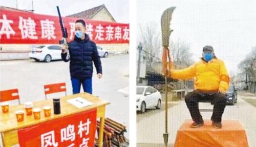 중국에서 무기를 들고 우한인의 마을 진입을 막는 모습 / 명보 캡처