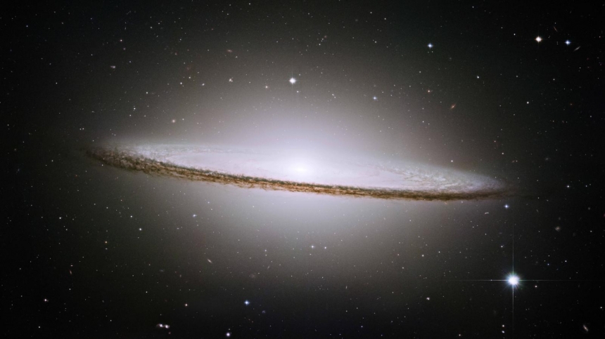 A little bit further away at 28 million light years from us, this is the Sombrero galaxy (M104) / NASA,Hubble Heritage,STScI,AURA