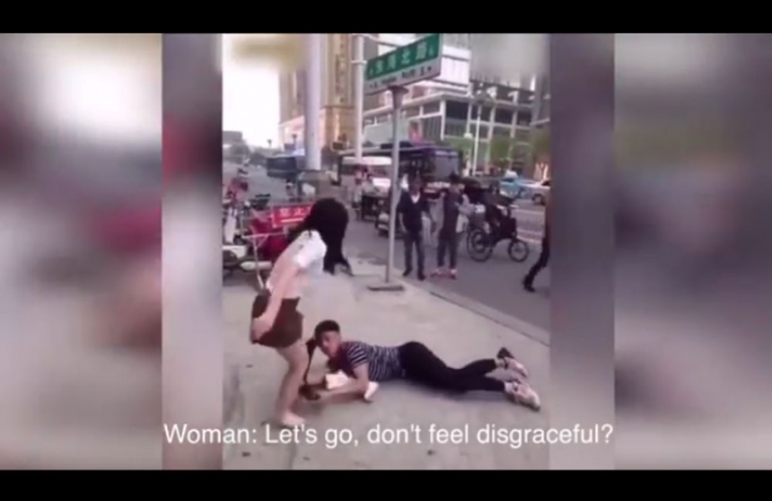 "Please don't leave me!" Jilted boyfriend clings to woman's leg as he begs her not to dump him