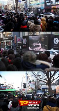 크리스마스 거리에 나타난 ‘EXO 트럭’, 시민 시선 집중